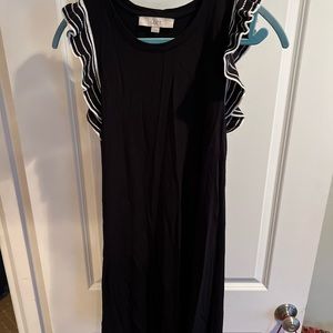 Black dress. Size M. White flutter sleeves. So comfy. Very soft material.